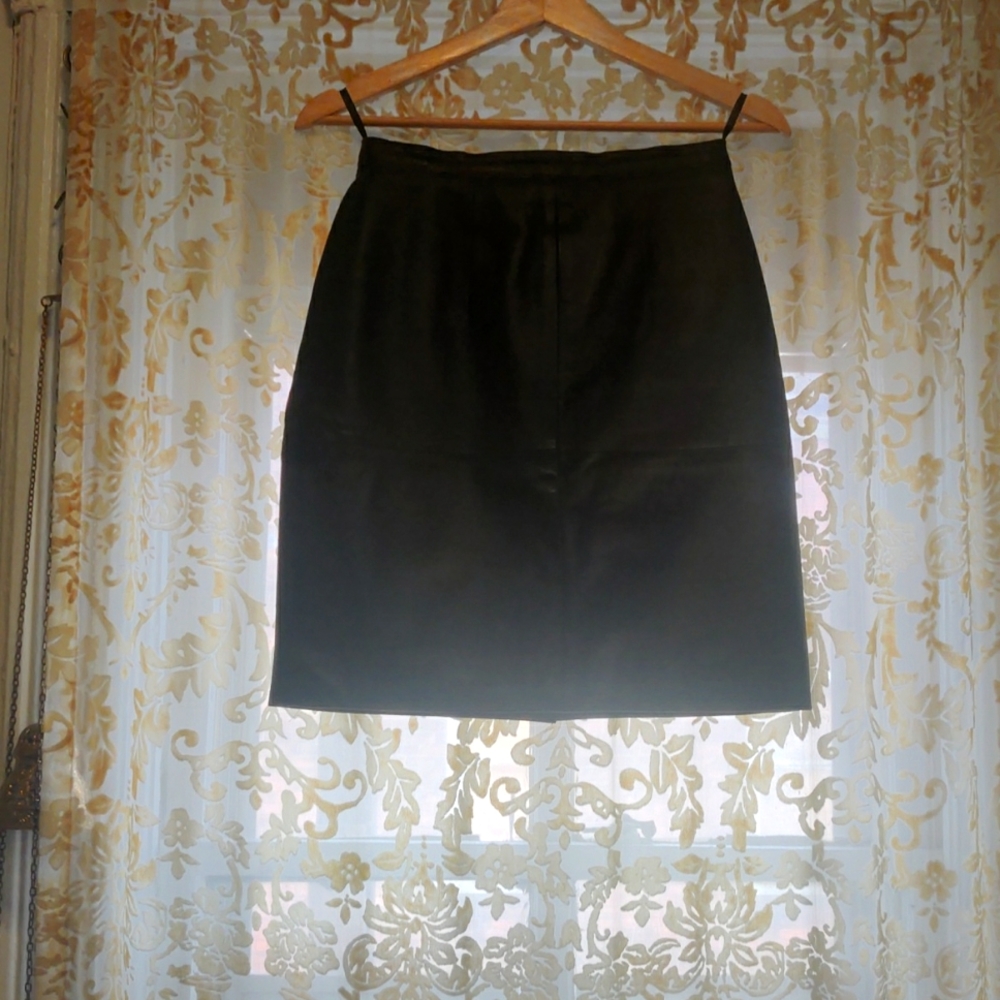 Black leather mini skirt.